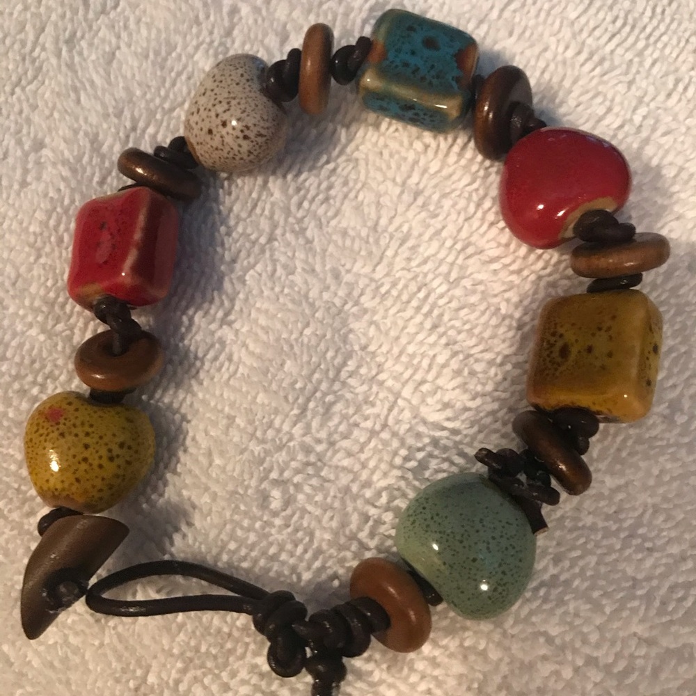 Handmade bracelet with glazed ceramic ornaments